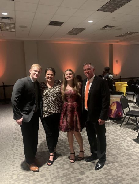 The Linn family, from left to right Austin, Amy, Alexis and Scott celebrate Scotts induction into the East Central University Athletic Hall of Fame, Feb. 2.