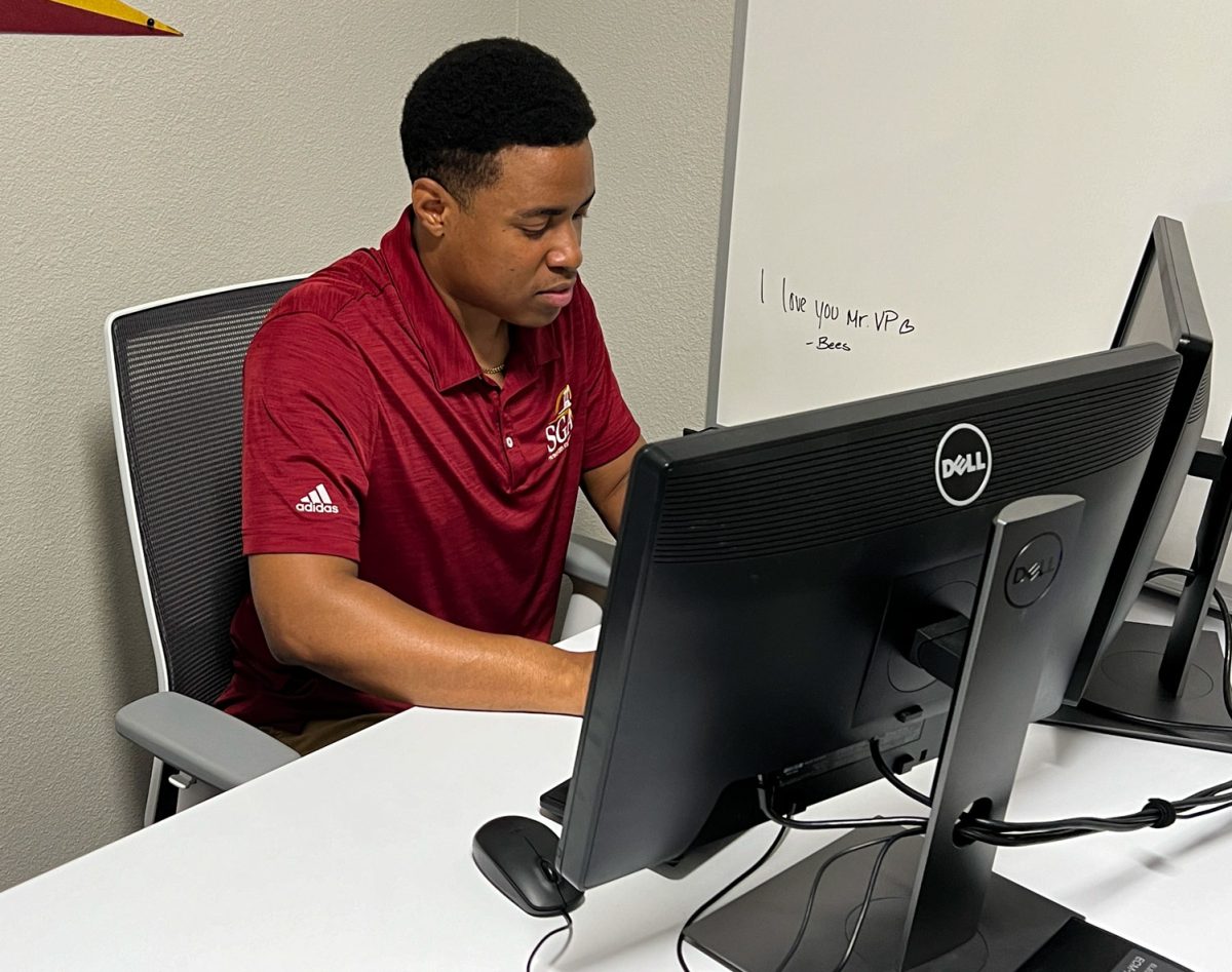 Vincent Peter works in his VPEA office, preparing for the transition to SGA President, May 1.