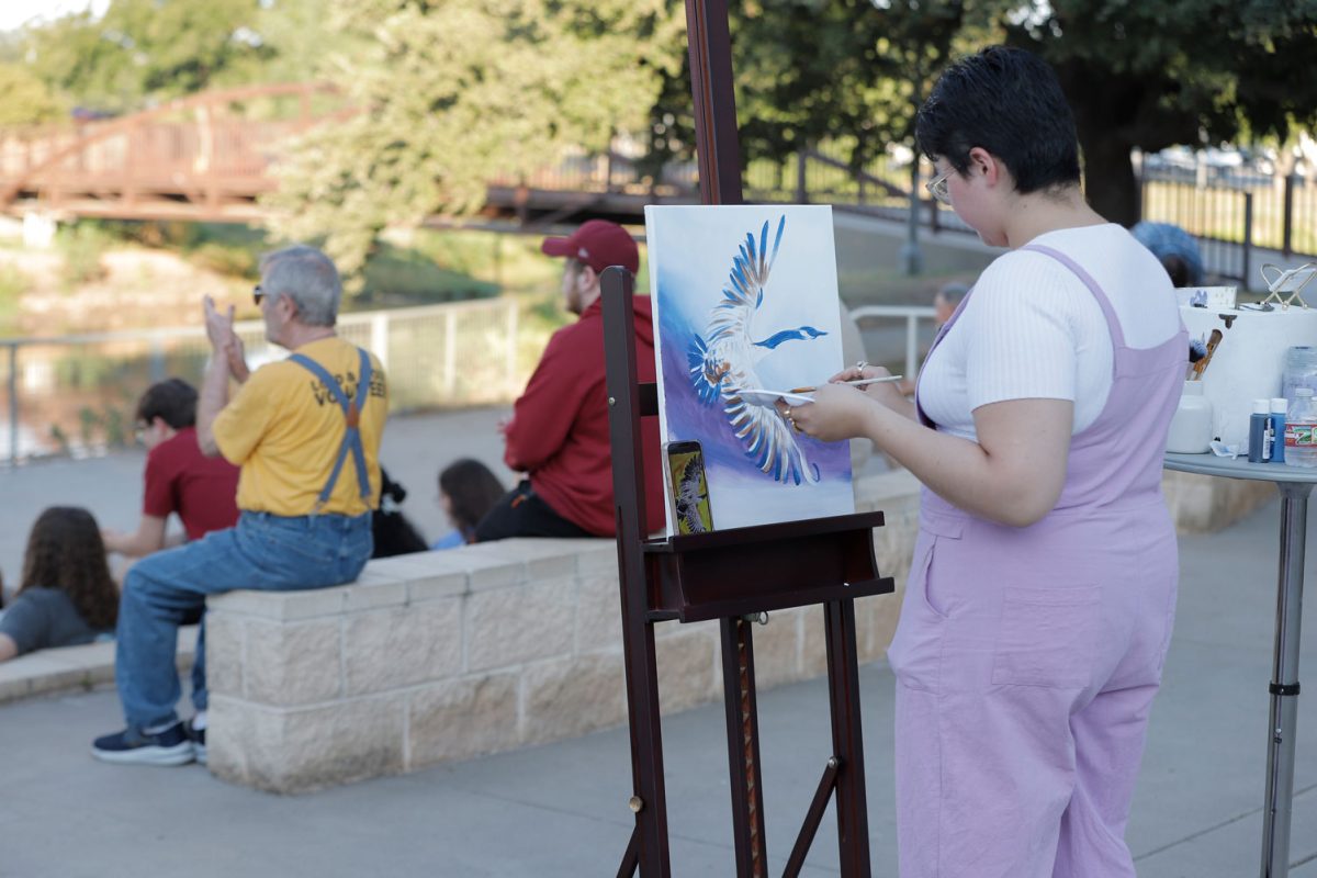 Natalia Hernáadez paints a Canadian goose, Sept. 5.