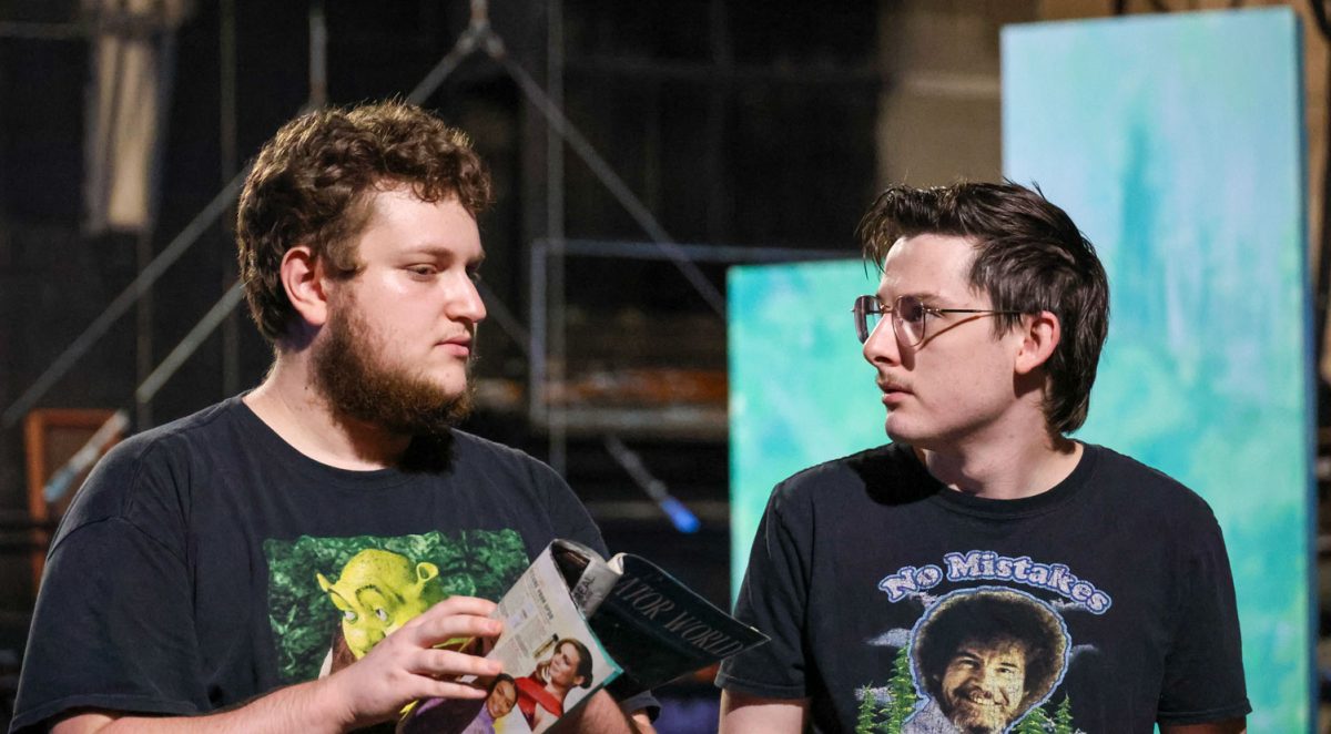 From left to right Eli Kuzmack theater tech senior and Brayden Young theater tech senior rehearse for the upcoming play: Mr. Burns, A Post-Electric Play Sept. 30.