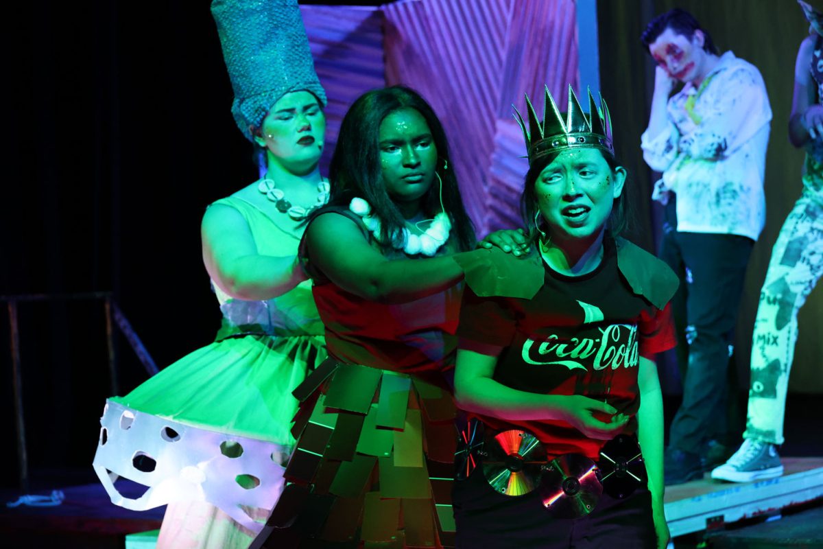 Megan Gibb performance freshman (left), Amaria Combie musical theatre junior (middle), Hannah Gode english sophomore (right). Gibb and Combie comfort Gode as she prepares to battle Mr. Burns to death, Oct. 7.