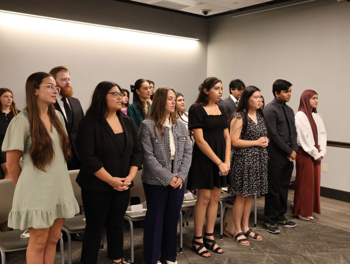 Inductees of the honor societies received recognition pins and certificates, Oct 30.