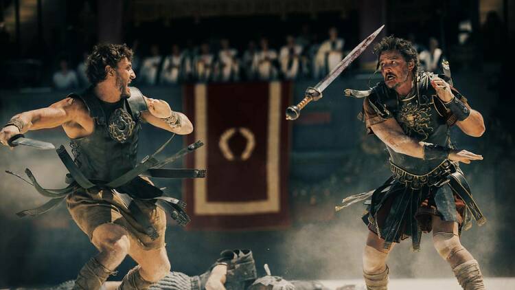 Lucius (left) disarms General Acacius (right) in a battle inside the Roman Colosseum during Gladiator II, Nov. 22.