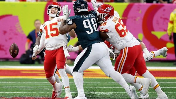 Patrick Mahomes (15) fumbles the ball after a hit from the Eagles defense, 
Feb. 9.